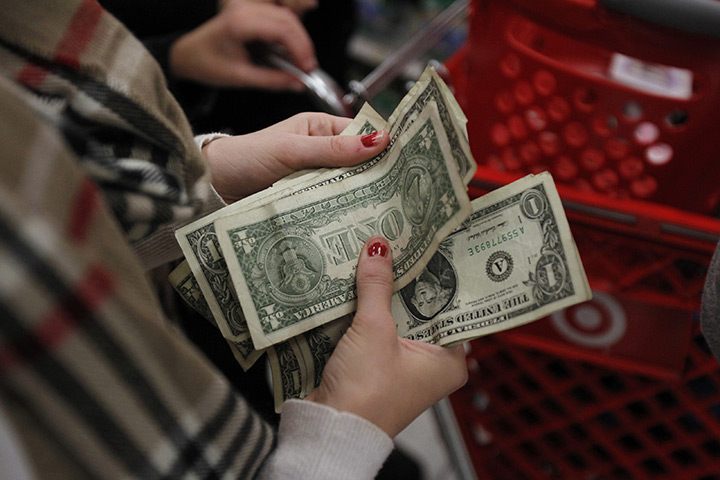 black friday: A customer counts her dollars in Torrington, Connecticut 