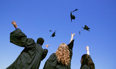 graduates throwing mortarboards