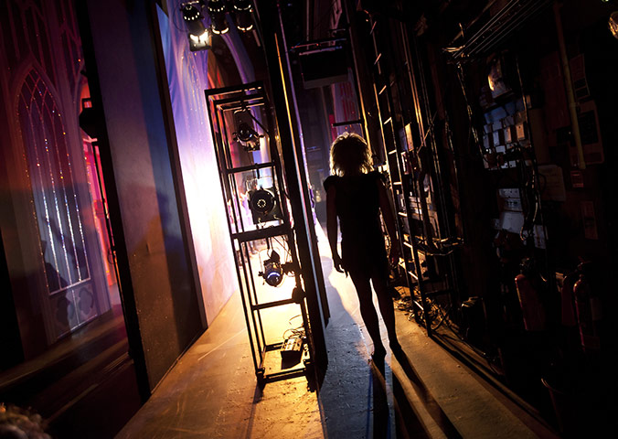 Cinderella pantomime: Jeffrey Longmore (Duchess Devilla) walks on stage from the wings