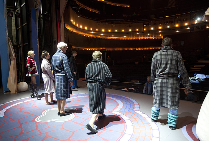 Cinderella pantomime: Cast members on stage go through a sound check in their dressing gowns
