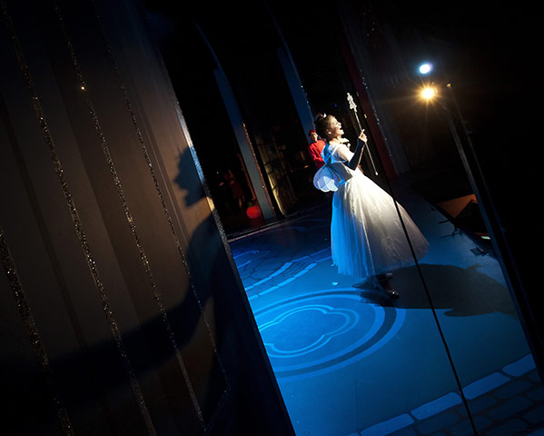 Cinderella pantomime: Nicole Webb (The Fairy Godmother) in song on stage