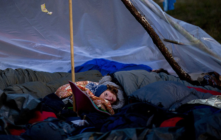 Germany  protests: Anti-nuclear protesters in sleeping bags lay on a street near Gorleben 
