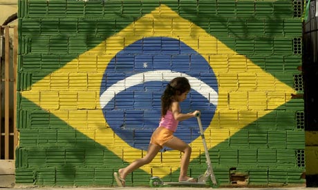 A young girl plays in Rio de Janeiro, which is to host the 2014 football World Cup and the 2016 Olympics. Photograph: Douglas Engle/AP