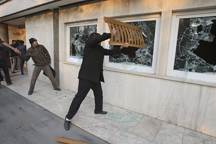 Tehran embassy: Iranian protesters break the windows of a British Embassy building, Tehran