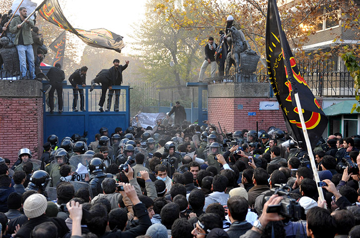 Tehran British embassy: A large number of protesters strom a security gate 
