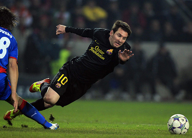 Best of the week in sport: Barcelona's Messi is fouled by Cisovsky of Viktoria Plzen 