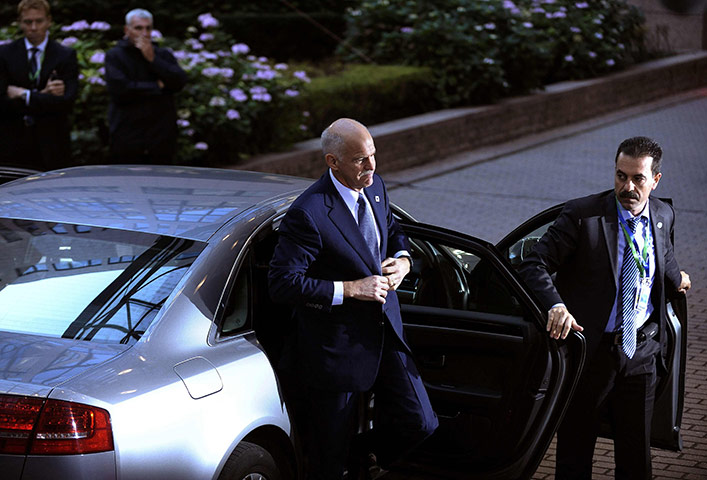 Week in business: Greece's PM Papandreou arrives at an European Union summit in Brussels