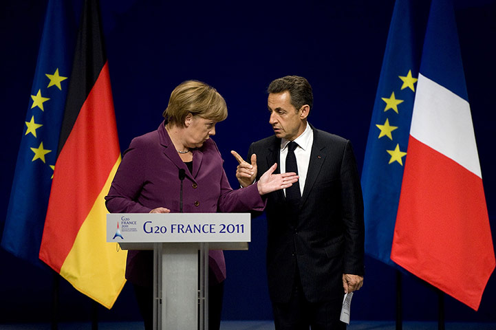 Week in business: Angela Merkel and Nicolas Sarkozy arrive for a press conference