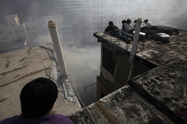 24 hours in pictures: fire in Mong Kok, Hong Kong