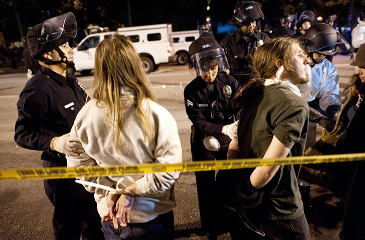 Occupy LA evictions: Los Angeles Police Department process two arrested Occupy LA protesters