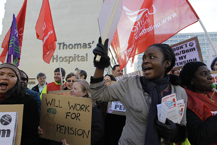 Strikers march: Health workers demonstrate during a strike outside St. Thomas' Hospital