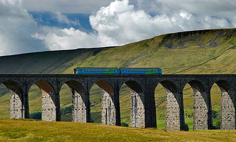 Passenger Train crossing the Ribblehead Railway Viaduct Settle Carlisle Leeds Line Yorkshire Dales