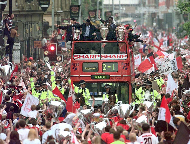 Fergie's 25 years: Huge crowds cheer as treble winners Manchester United parade their trophies