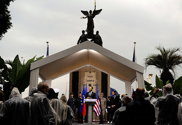 24 hours:  US President Barack Obama talks next to Nicolas Sarkozy in Cannes