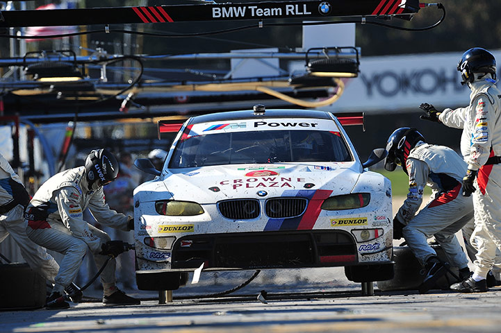 Petit Le Mans: Dirk Werner in for a pit stop in the #55 BMW Team RLL BMW M3 