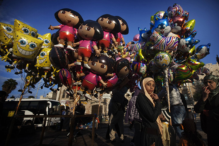 24 hours in pictures: balloons on sale outside the Damascus Gate in JErusalem