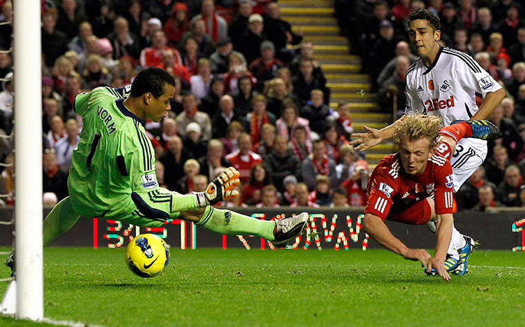 football: Liverpool's Kuyt heads