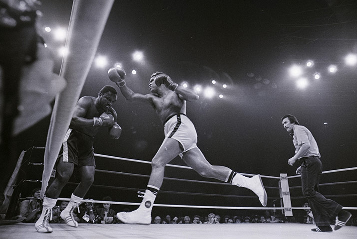 Joe Frazier: Muhammad Ali lunges at Joe Frazier - Thrilla in Manila 1975