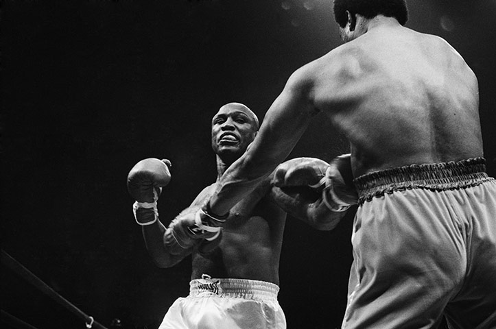 Joe Frazier: boxers joe frazier and george foreman fighting in 1976