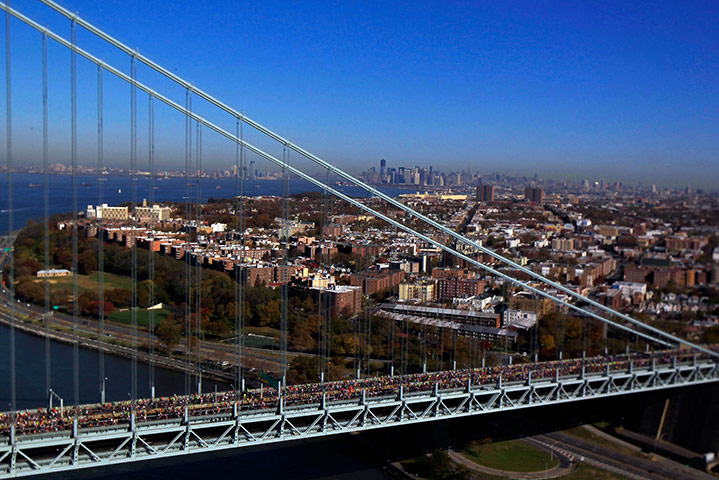 24 hours: New York, USA: Runners on the Verrazano-Narrows Bridge during the marathon