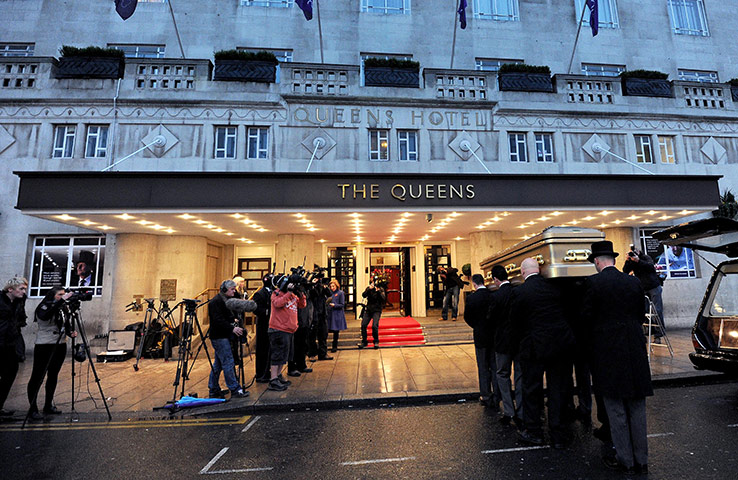 Jimmy Savile funeral: The golden coffin of Jimmy Savile is carried into the Queens Hotel in Leeds