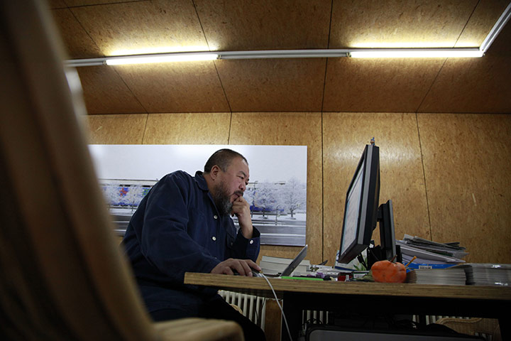 Ai Weiwei: Ai Weiwei works in front of a computer
