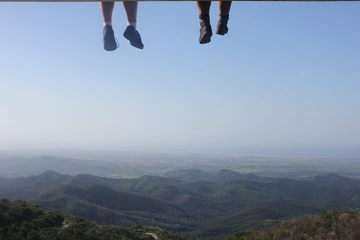 Your pictures: legs dangling over a viewing platform in Cuba