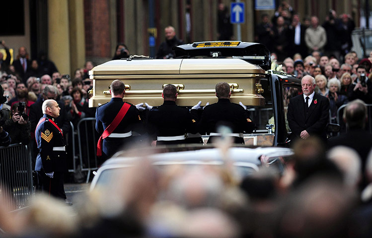 Jimmy Savile funeral: The coffin of Sir Jimmy Savile is carried from St Anne's Cathedral