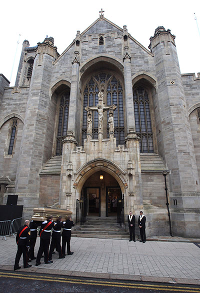 Jimmy Savile funeral: Pall bearers from the Royal Marines carry the coffin of Sir Jimmy Savile