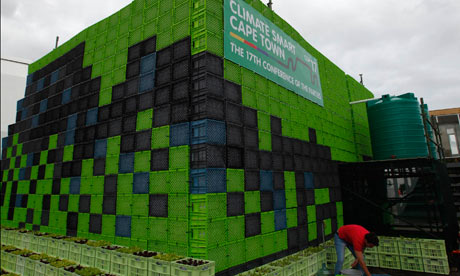 A man plants vegetables at the UN climate conference in Durban