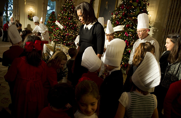 24 hours in pictures: Michelle Obama talks with children of active duty military personnel