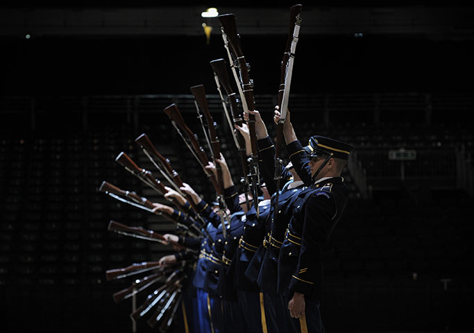 24 hours in pictures: Soldiers from the US Army Drill Team perform, London
