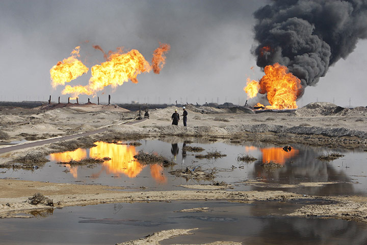 Week in business: Excess gas is burned off near workers southeast of Baghdad