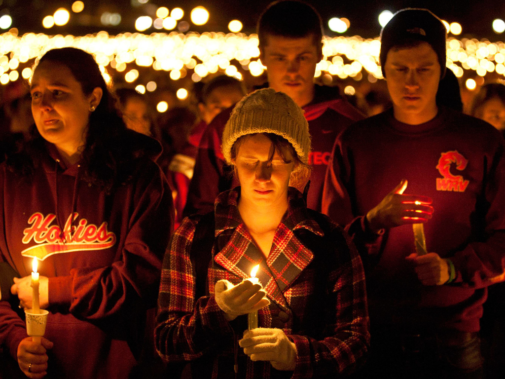 Virginia Tech students during a candlelight vigil for slain police officer Deriek W. Crouse
