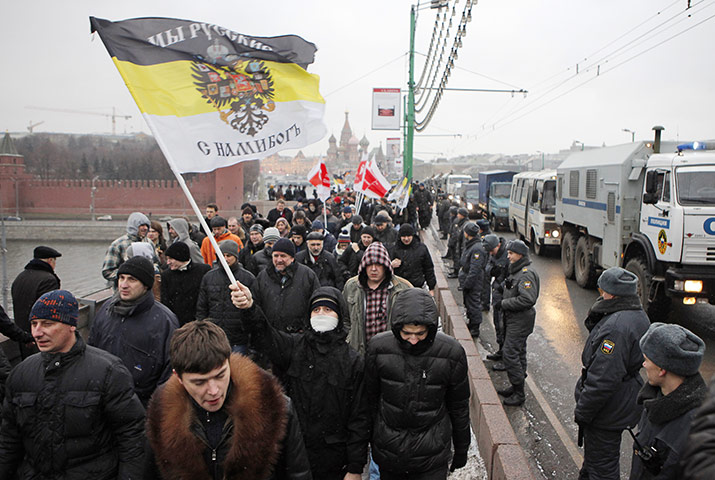Moscow protests: Protesters wave an old Russian flag