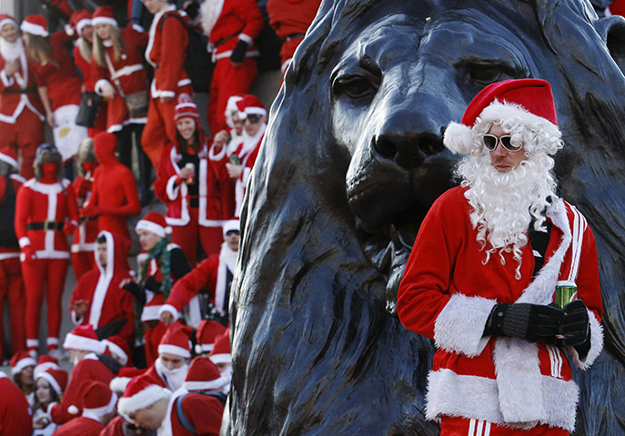 SantaCon 2011: People dressed as Santa Claus fill Trafalgar Square for Santacon 2011