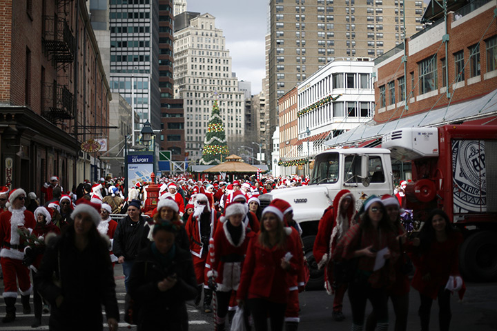 SantaCon 2011: Revelers dressed as Santa Claus gather at the South Street Seaport