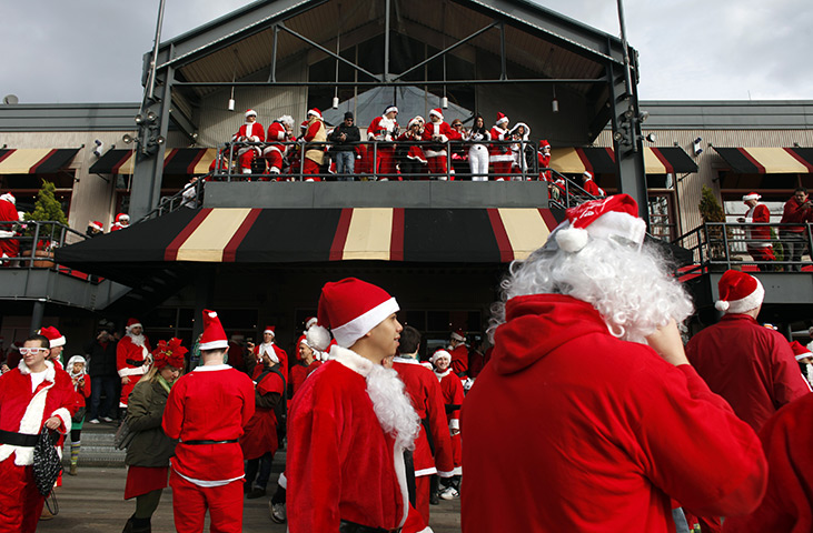 SantaCon 2011: Revelers dressed as Santa Claus at the South Street Seaport, New York City