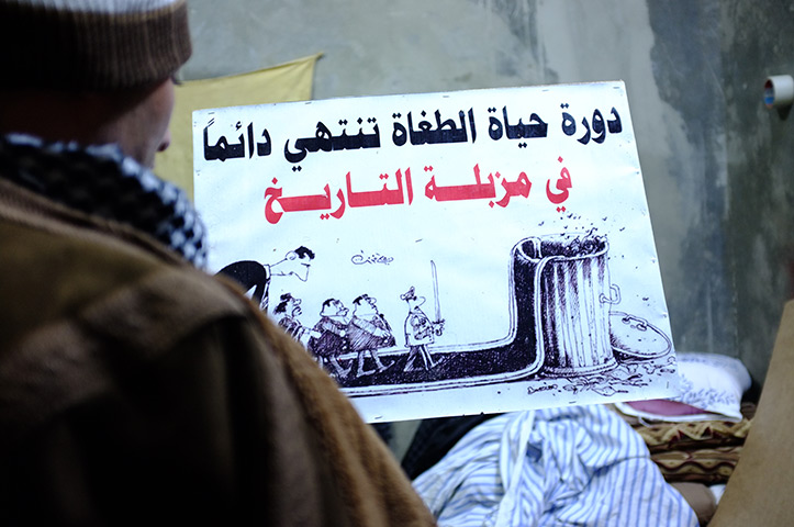 Syria: Activists prepare placards for Friday demonstrations in Benish  