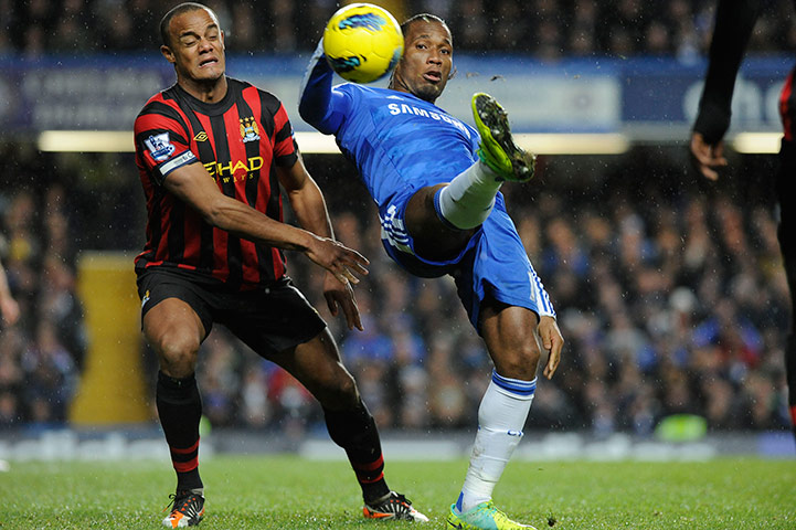 Chelsea v Man City: Drogba flicks the ball past Kompany