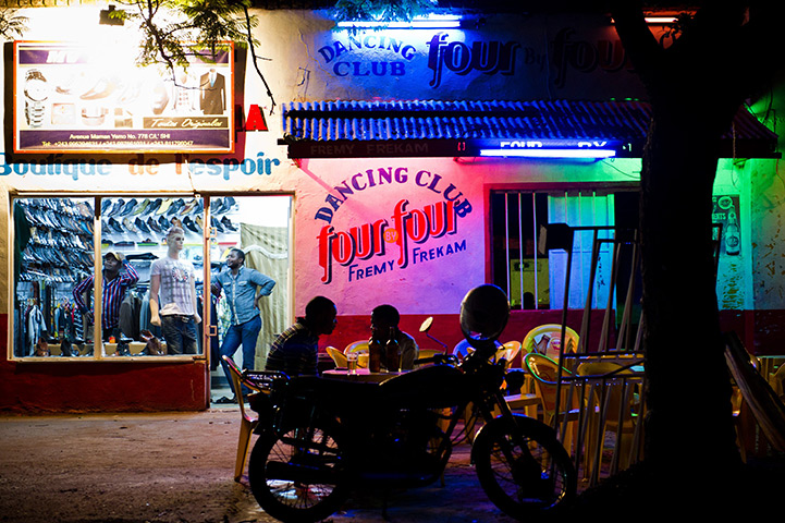 24 hours: Lubumbashi, Democratic Republic of the Congo: Congolese men sit at a bar