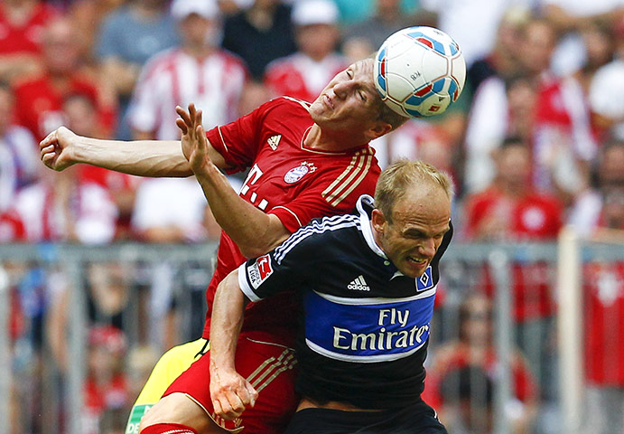 Man Utd targets: Bayern Munich's Bastian Schweinsteiger challenges Hamburg's David Jarolim