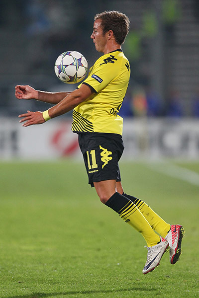 Man Utd targets: Mario Goetze of Borussia Dortmund controls the ball on his chest