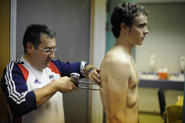 Team Pursuit Boot Camp: Nutritionist Nigel Mitchell conducts a skin-fold test on Steven Burke