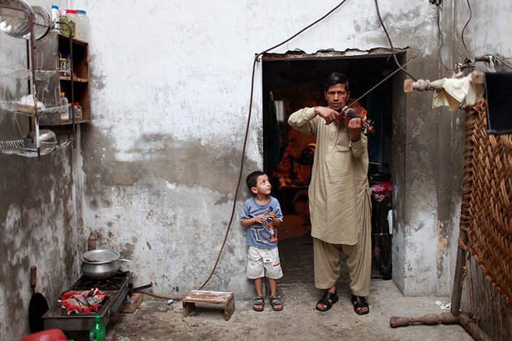Declan Walsh: Lahore, Pakistan: Musician Mubarak Ali of the Sachal Studios Orchestra