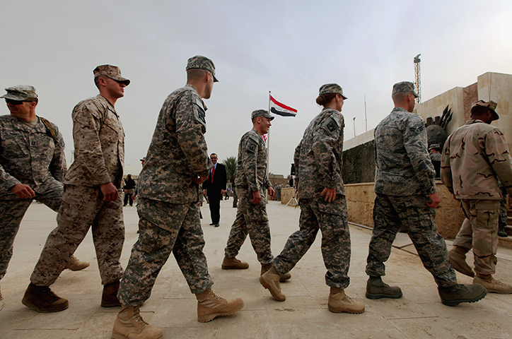 US marks Iraq exit: Military personnel depart as the Iraqi flag flies