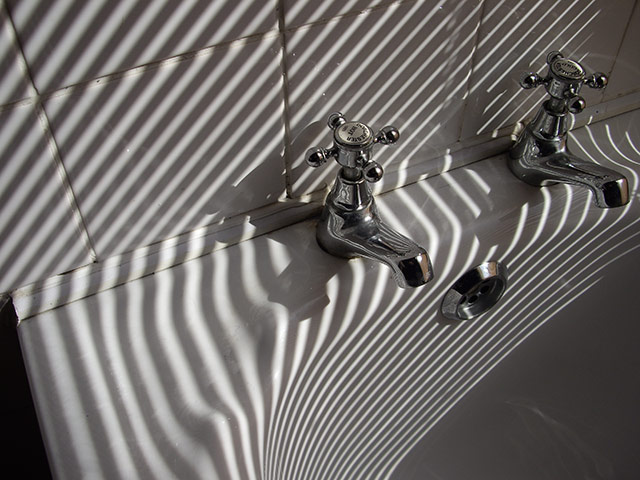 Weekend Readers' pictures: striped shadows on sink