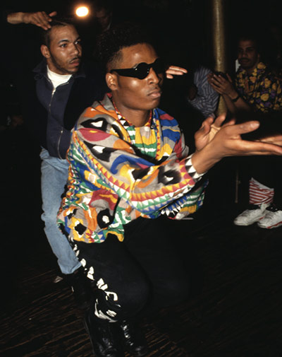 Voguing gallery: Voguing battle in brightly coloured shirt