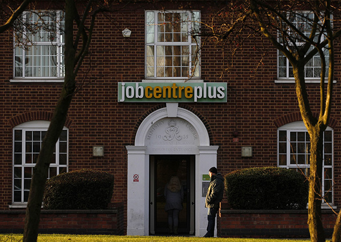 Week in Business: A man stands outside a  Job Centre employment office in Coalville