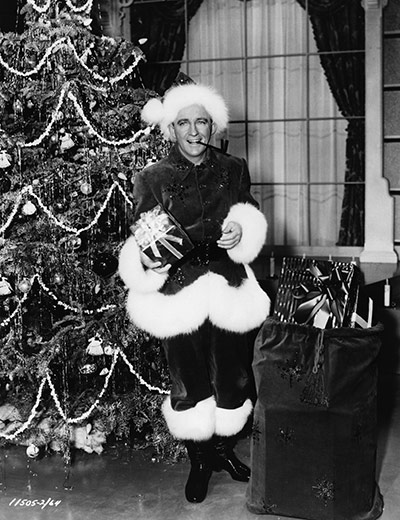 10 best christmas songs: Bing Crosby Playing Santa Claus